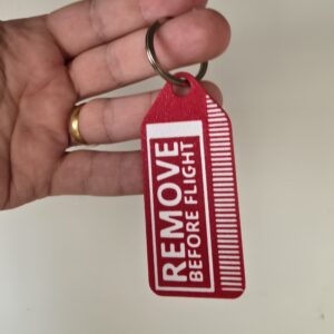Chaveiro FLYNG - TAG REMOVE BEFORE FLIGHT